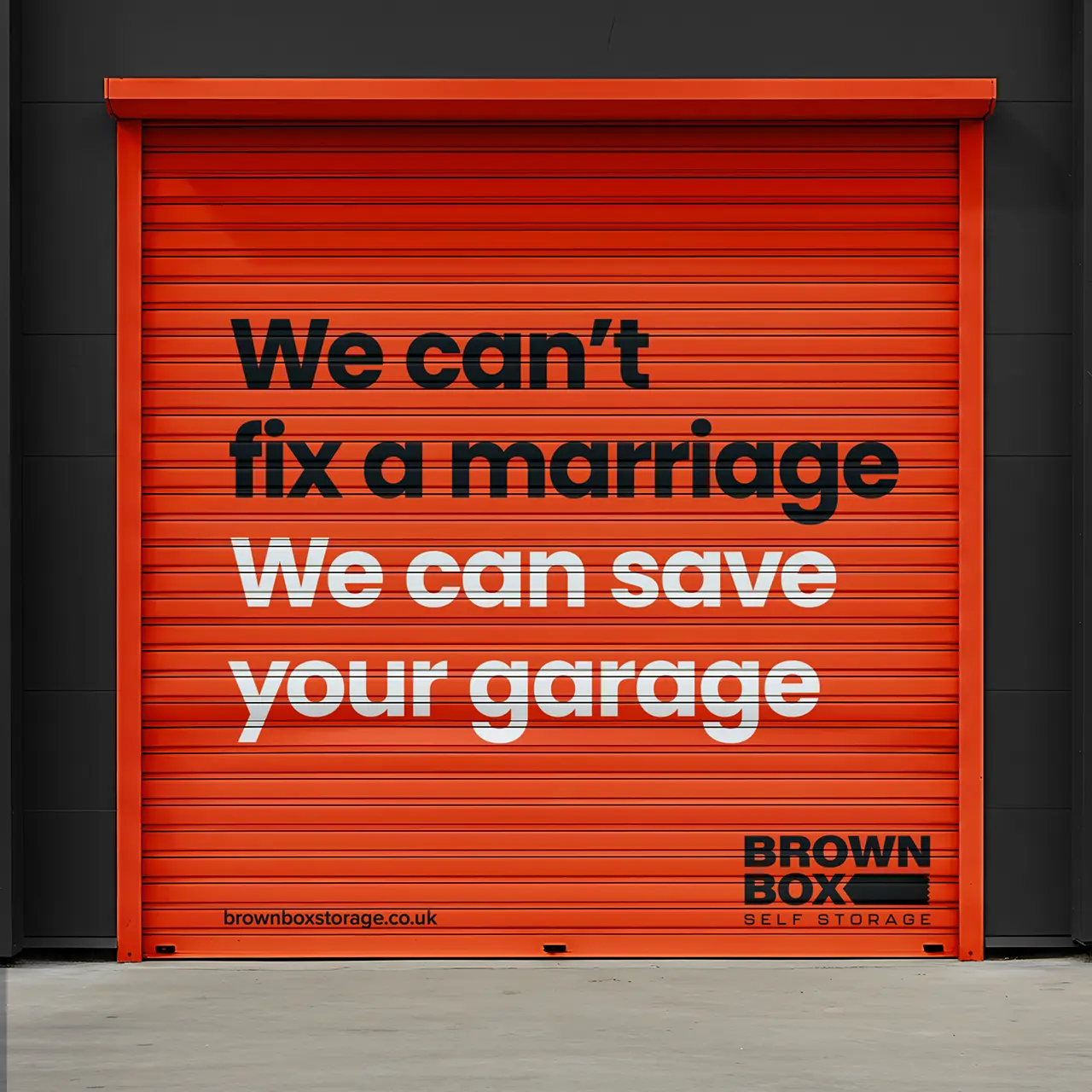 Brown Box Storage unit shutters with brand creative copywriting 'We can't fix a marriage, we can save your garage.