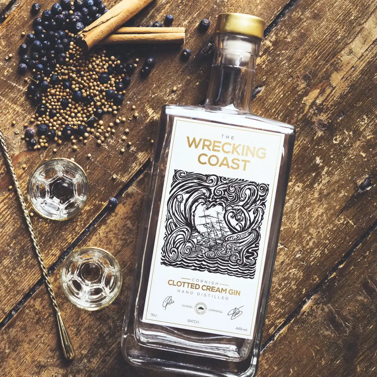 Cornish Clotted Cream Gin The Wrecking Coast Cornish Clotted Cream Gin bottle on a wooden floor shot from above