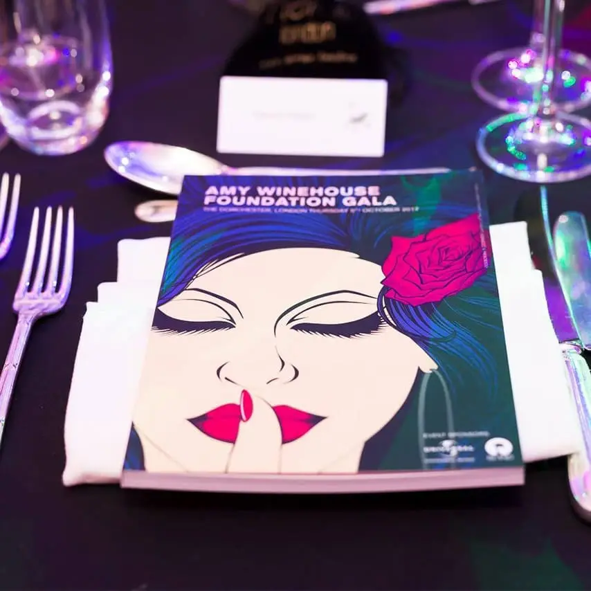 A Photograph of the event brochure on the table